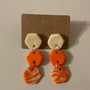 White and orange 3 tier dangle earrings
